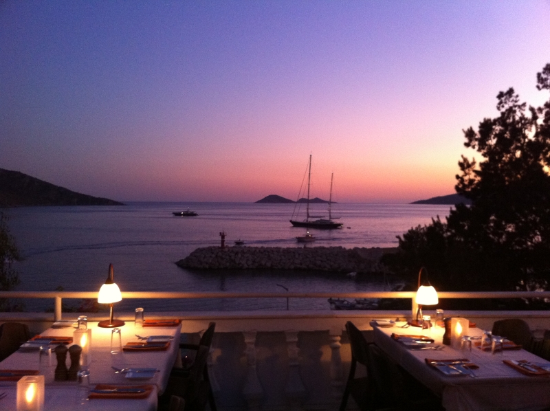 rooftop tables at sunset with lamps