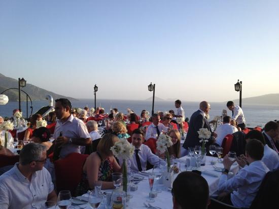 bustling rooftop restaurant dining with views of Kalkan