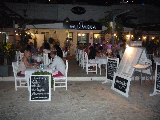front of Mussakka restaurant with tables and guests